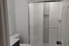FRANKFORT-BASEMENT-SHOWER-TILE-CUSTOM-PENNY-STRIP