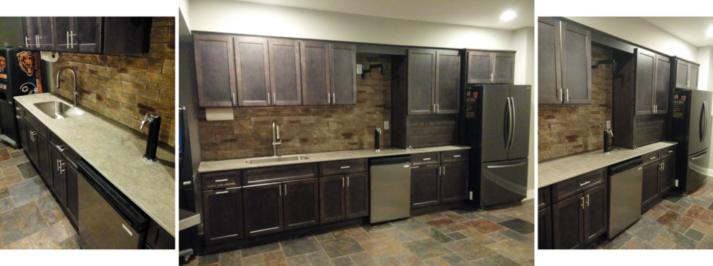 Modern kitchen with dark cabinets and appliances.