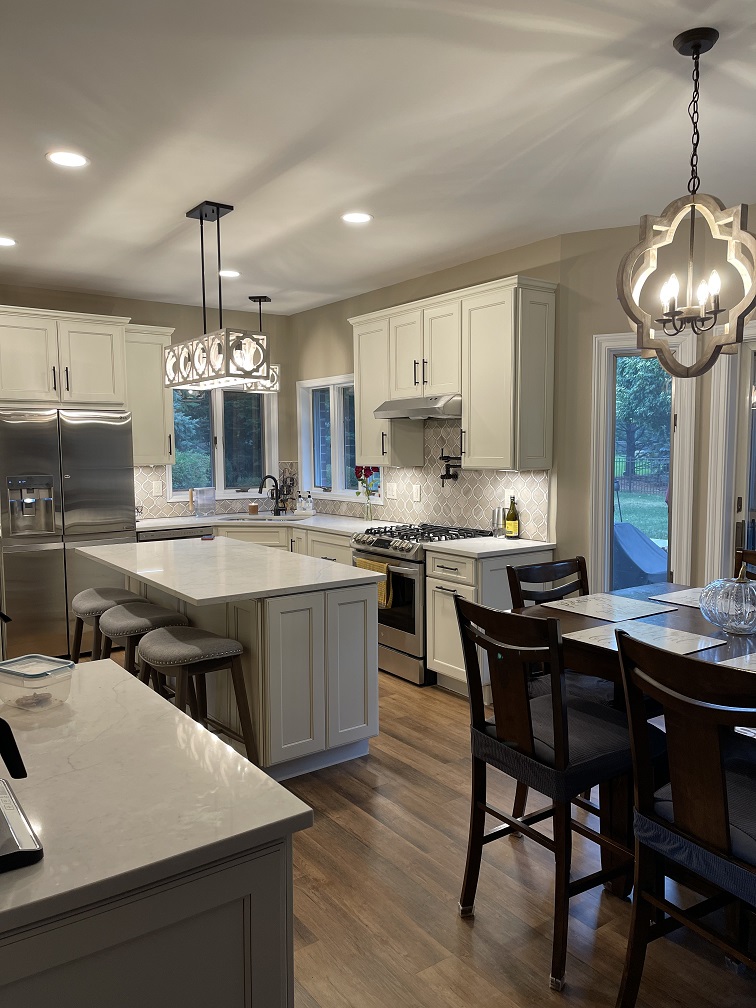 Modern kitchen with elegant lighting fixtures.