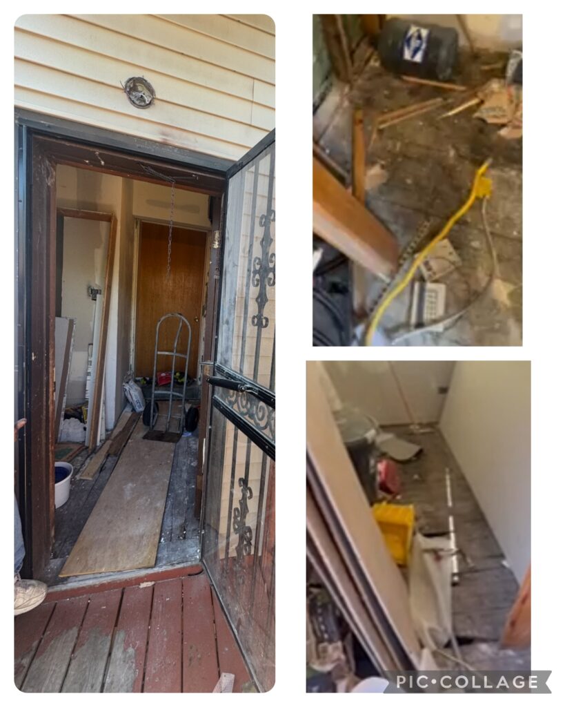 Wooden door installation with stair railing adjustments in progress.